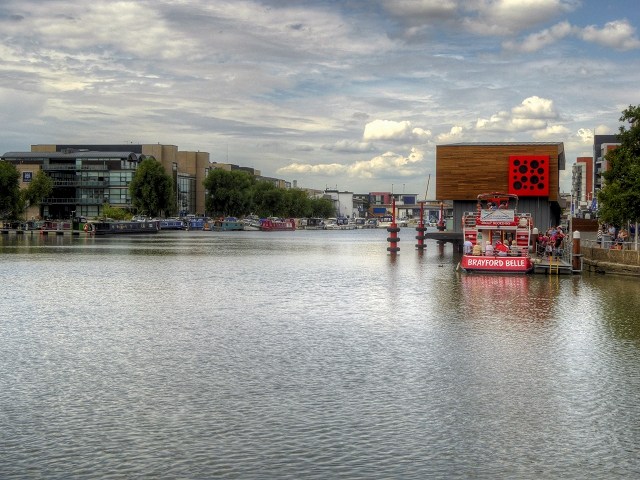 Brayford Pool in Lincoln, with buildings and moored boats across the water
